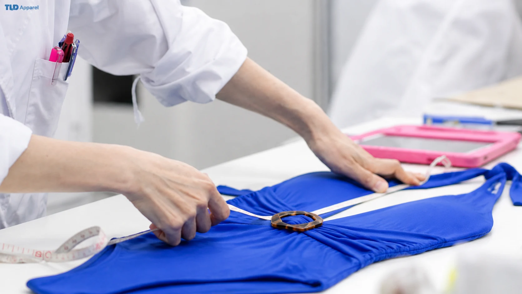 Quality control measurement on a blue swimsuit